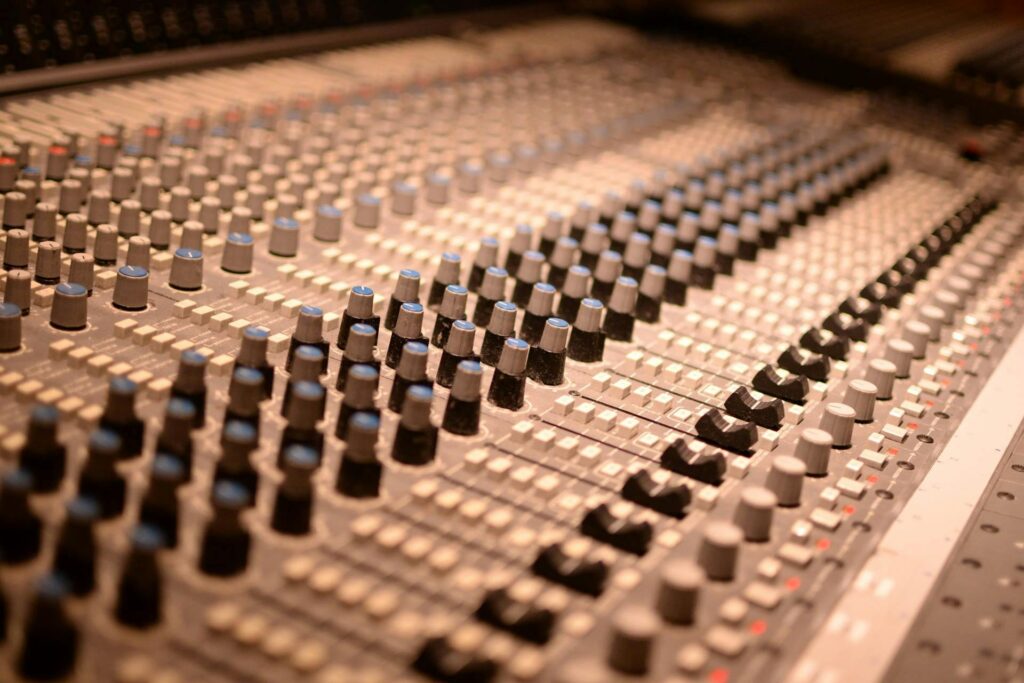 studio recording - close up on a mixing sound desk